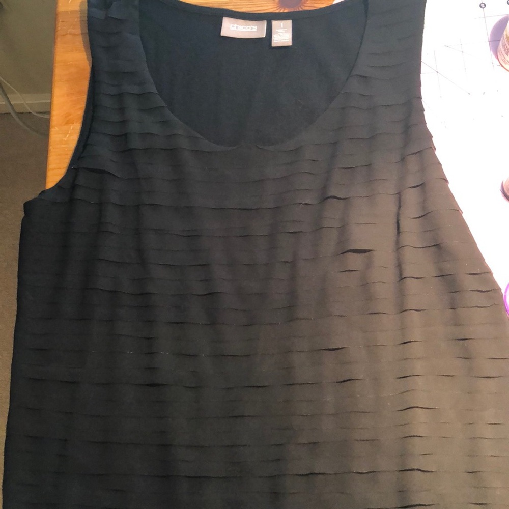 Chico’s black sleeveless top with tiny layers.